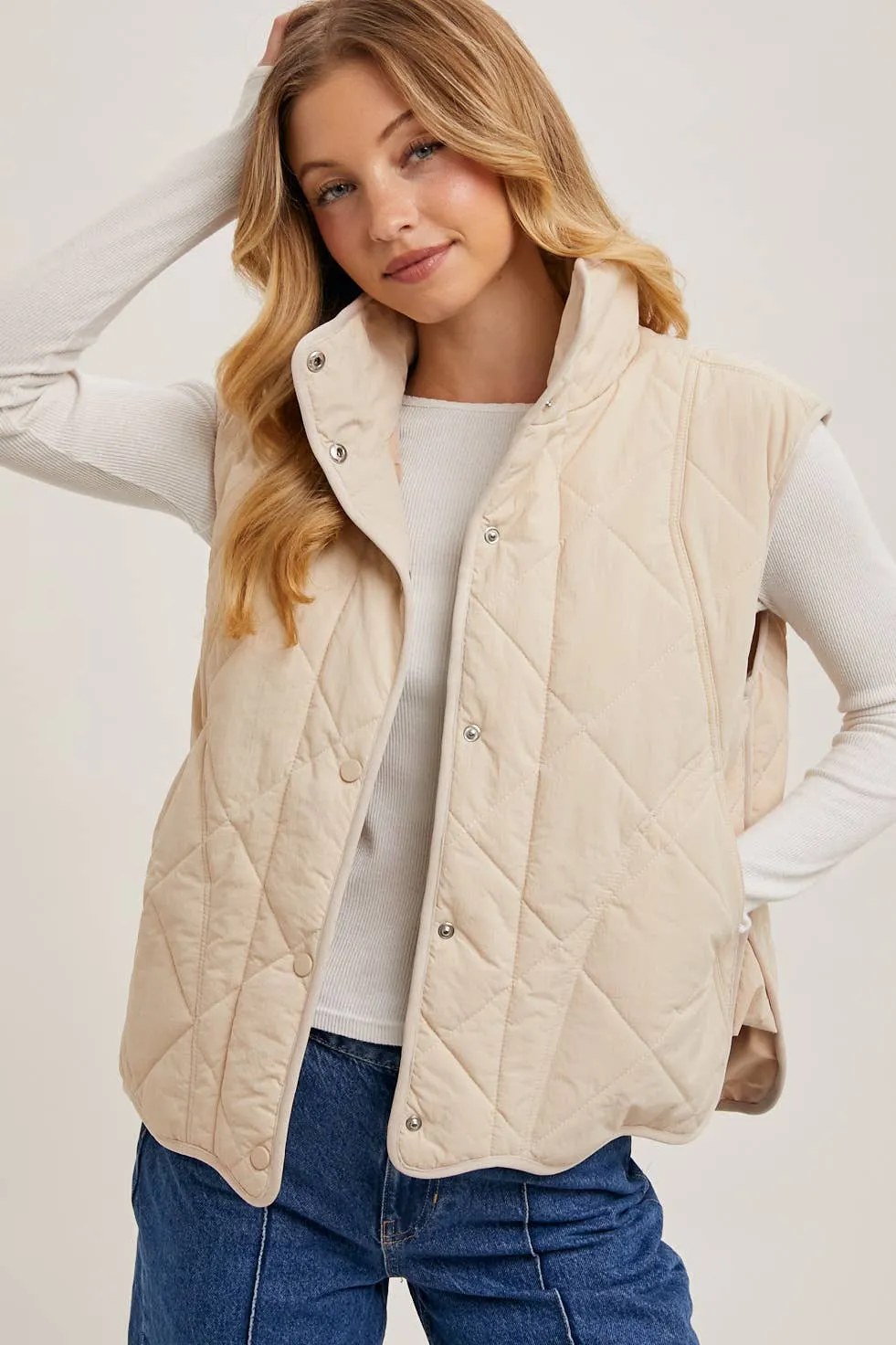 BUTTON DOWN QUILTED PUFFER VEST WITH POCKETS