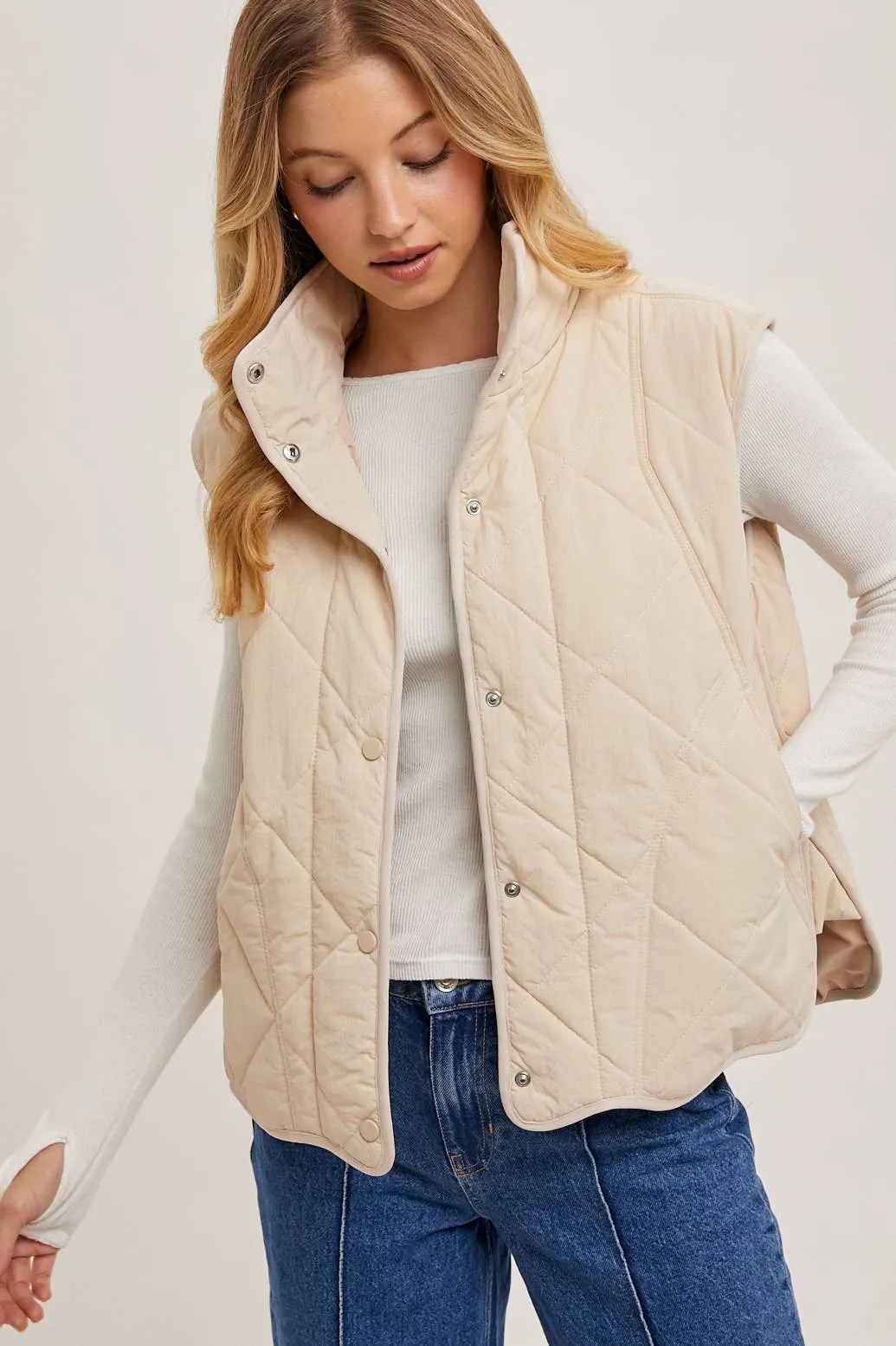 BUTTON DOWN QUILTED PUFFER VEST WITH POCKETS