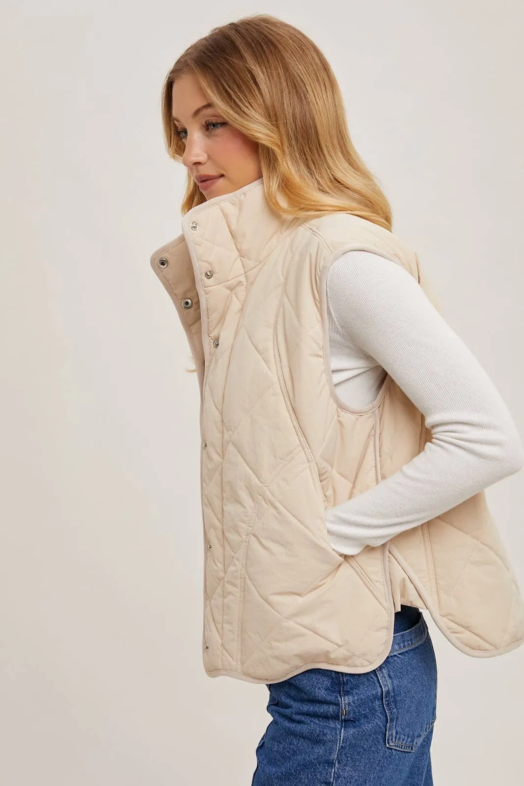 BUTTON DOWN QUILTED PUFFER VEST WITH POCKETS