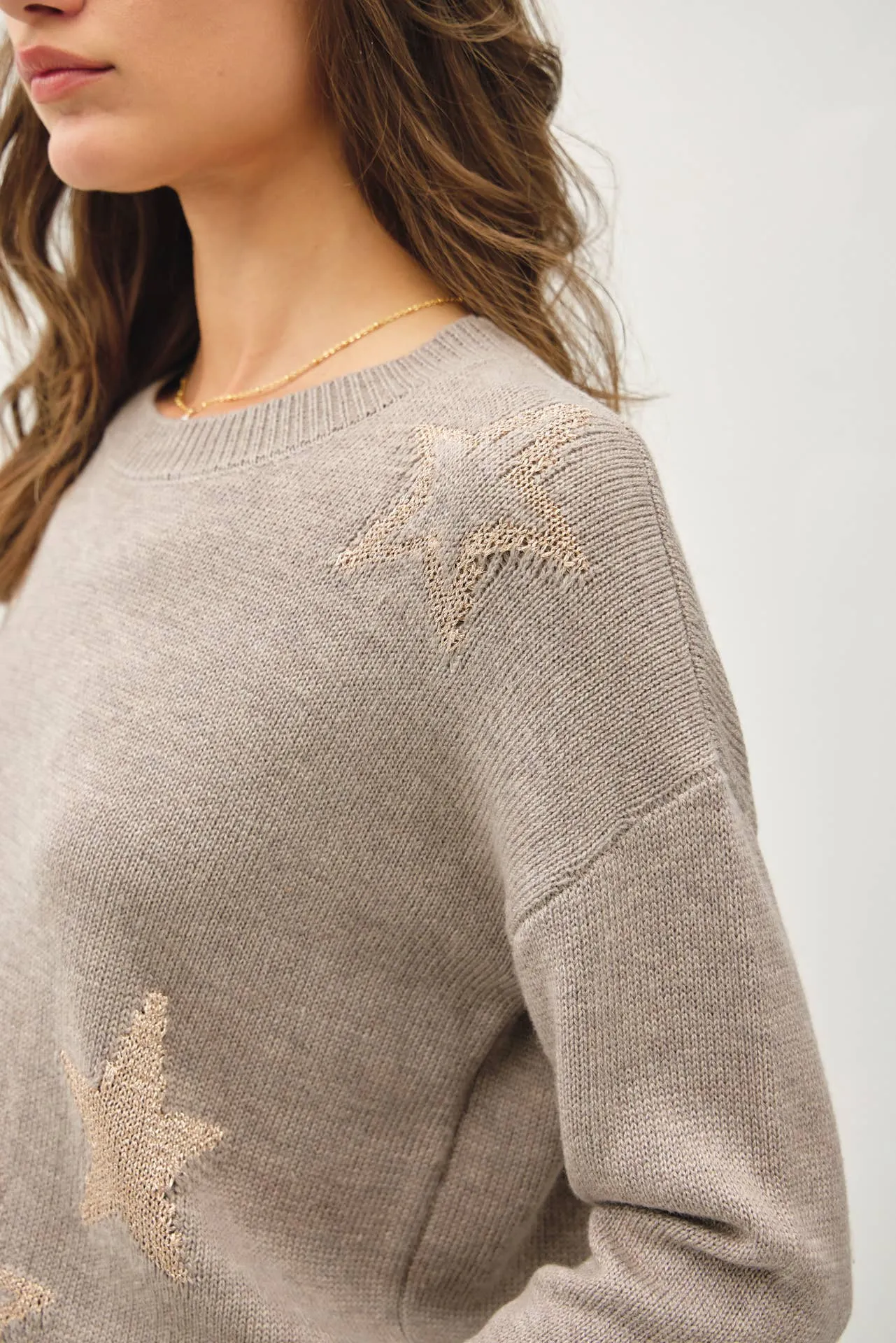 CREW NECK SWEATER WITH METALLIC STAR DESIGN